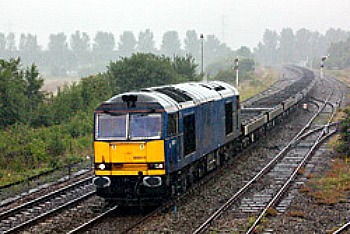 C2C rail Cargo Train Leaving a East Coast Station